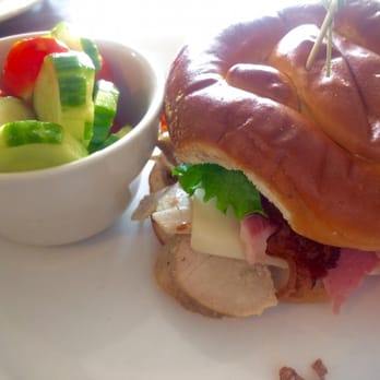 Iron Rooster - Pretzel club with cucumber and tomato salad - Cocktail Bars Near Me - Annapolis, Maryland