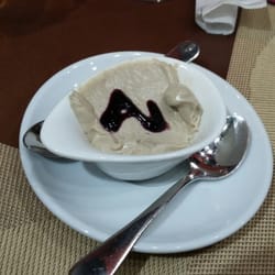 La Cabaña - Crema de platano con coulis de frambuesa