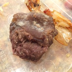 Apple China - This is the giant piece of chunky beef that nearly choked me out of my mind. Wonder what kind of animal it is...
