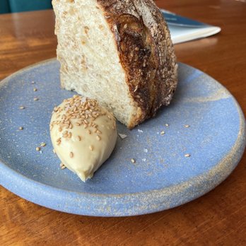 Squable - Normally don't order a bread, but worth it here. Both bread and their butter were delish!! - Modern European Near Me - Houston, Texas