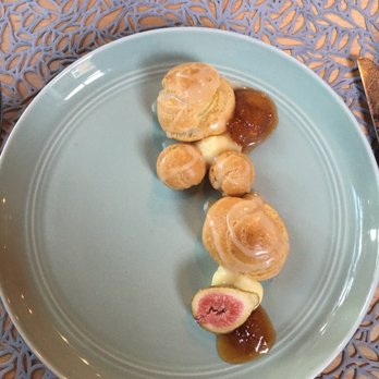 Vestige - 4th: orange glazed profiteroles, fig jam, brown butter peach coulis - New American Near Me - Ocean Springs, Mississippi Vestige - 4th: orange glazed profiteroles, fig jam, brown butter peach coulis - New American Near Me - Ocean Springs, Mississippi