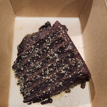 The Hive Bar & Grill - Black Gold Chocolate cake... they gave a side of chocolate ganache for drizzling - American Near Me - Wildomar, California