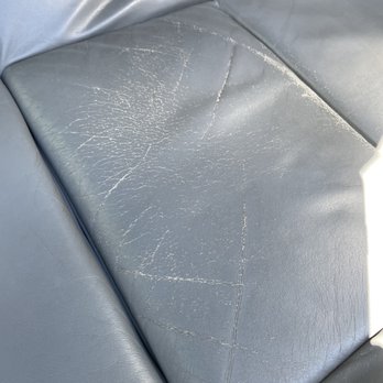 Pioneer Leather Restoration - Close up of drivers seat bottom before restoration. - Furniture Reupholstery Near Me - Orange, California Pioneer Leather Restoration - Close up of drivers seat bottom before restoration. - Furniture Reupholstery Near Me - Orange, California