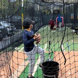 San Diego School of Baseball - Coach Steve teaching my son proper pitching mechanics.