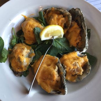 Skipper's Fish Camp - Baked oyster with crab and cheese on top - Seafood Near Me - Darien, Georgia Skipper's Fish Camp - Baked oyster with crab and cheese on top - Seafood Near Me - Darien, Georgia