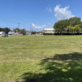 Pass Point Lawn - a view of a parking lot - Lawn Services Near Me - Pascagoula, Mississippi Pass Point Lawn - a view of a parking lot - Lawn Services Near Me - Pascagoula, Mississippi