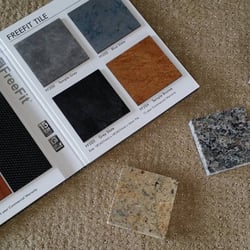 Floor Max - Some of our options on vynil plank and granite. Ideal for commercial jobs.