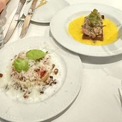 Le Café du Clocher Penché - Steak tartare with Shishito peppers over brioche, and tartelette de tomate with béchamel and lardon and topped with shredded sheep cheese.