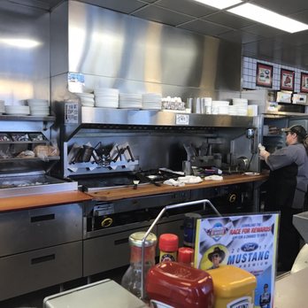 Waffle House - a man and a woman in the kitchen - Breakfast & Brunch Near Me - Erlanger, Kentucky
