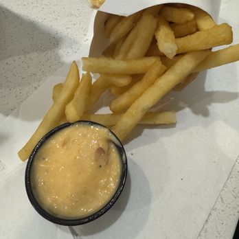 7th Street Burger Astoria - Fries and Side of Ghost Pepper Sauce - Burgers Near Me - City, New York 7th Street Burger Astoria - Fries and Side of Ghost Pepper Sauce - Burgers Near Me - City, New York