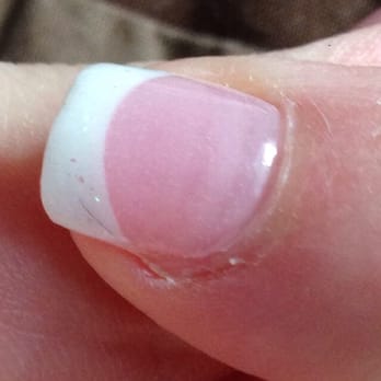 7 Nail Spa - Black brush fiber in my white tip. - Nail Salons Near Me - Santa Rosa, California