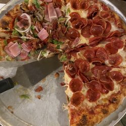 Palermo Pizzeria & Restaurant - Medium half Super Deluxe (light onions), half triple spicy/cupping pepperoni. 100% delicious!