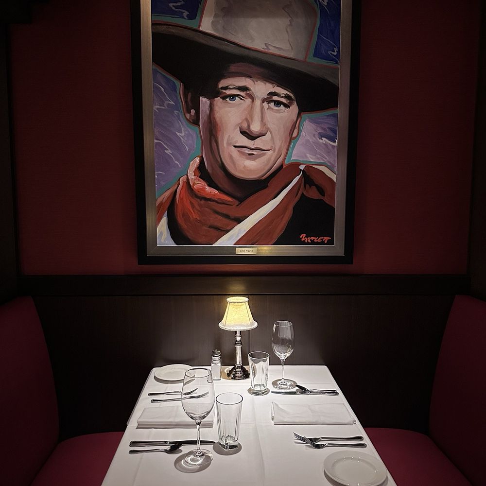 The Capital Grille - Each table in Burbank is graced with a painting of famous Hollywood celebrities. - Steakhouses Near Me - Burbank, California The Capital Grille - Each table in Burbank is graced with a painting of famous Hollywood celebrities. - Steakhouses Near Me - Burbank, California