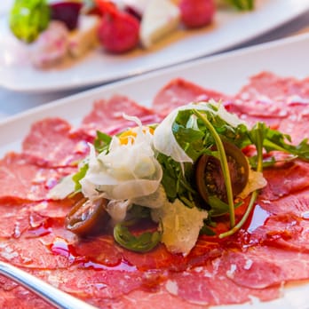 Trecento Quindici - a plate of meat and vegetables - Italian Near Me - Aspen, Colorado Trecento Quindici - a plate of meat and vegetables - Italian Near Me - Aspen, Colorado
