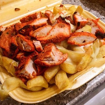 Chanda Cottage - A closer look at the chips, cheese and chicken tikka - highlight of the meal. - Fast Food Near Me - Baillieston, GLG