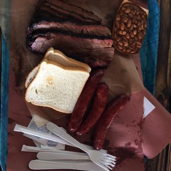Franklin Barbecue - 1 lb brisket with 2 links of sausage with a small beans. Yas sooooo good! - Barbeque Near Me - Austin, Texas