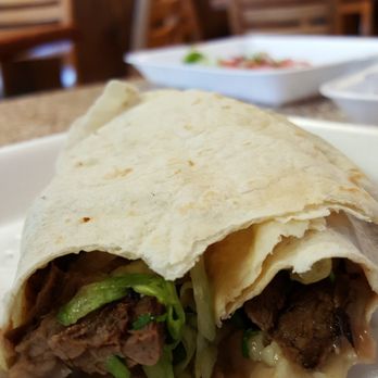 Tacos Chiwas - Half if my asada burrito. I got excited and ate the other half before snapping a shot. - Mexican Near Me - Phoenix, Arizona