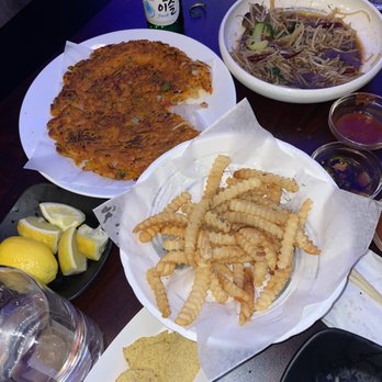 Nolza - Truffle oil fries, stir-fried brisket with bean sprouts, and kimchi pancake - Pubs Near Me - Buena Park, California Nolza - Truffle oil fries, stir-fried brisket with bean sprouts, and kimchi pancake - Pubs Near Me - Buena Park, California