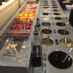 Condiments bar with a good variety of sauces and pickled vegetables