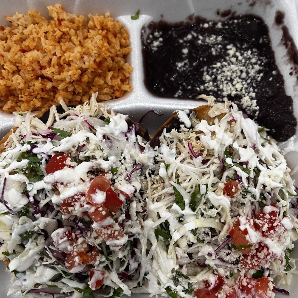 Chicken Tostadas 2 chicken tostadas Spanish rice & black beans Chicken Tostadas 2 chicken tostadas Spanish rice & black beans
