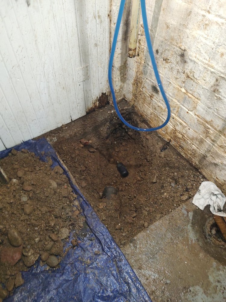 Slide of Sharrer's Plumbing N Drain Cleaning Construction