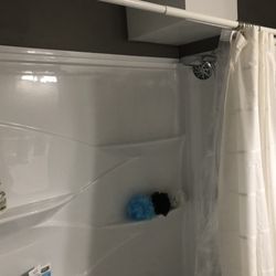 Felix Ruiz Construction - Relocated the tub/shower. New surround.
