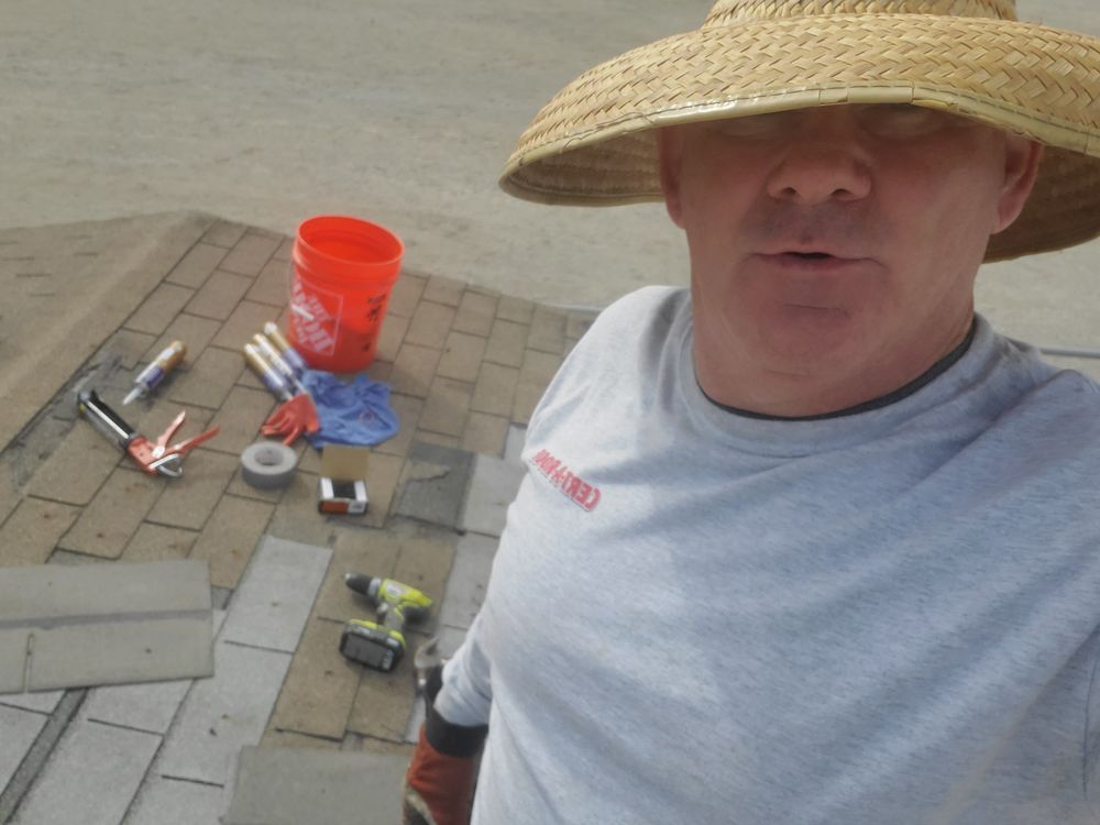 Slide of Mikes Roofing