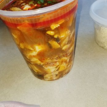 Kitchen Door - Quart lunch container of the SPICY tofu soondubu with mushrooms. Really delicious. Comes with white rice. - Korean Near Me - Farmingdale, New York Kitchen Door - Quart lunch container of the SPICY tofu soondubu with mushrooms. Really delicious. Comes with white rice. - Korean Near Me - Farmingdale, New York