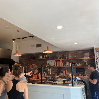 Raphael’s Bakery - a group of people at a counter - Bakeries Near Me - Greenwich, Connecticut