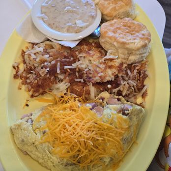 The Blueberry Cafe - Meat lovers omlet with side of biscuits and gravy - Waffles Near Me - Kettering, Ohio