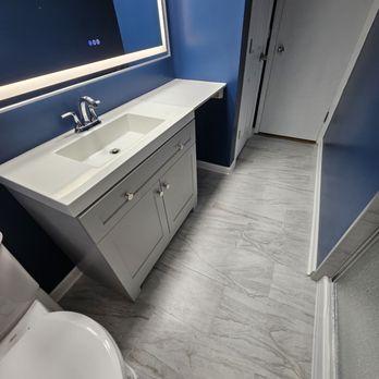 Calderon Remodeling & Landscaping - Here he installed a new vanity extending my vanity top to provide extra counter space. Update my floors. - General Contractors Near Me - Chicago Heights, Illinois
