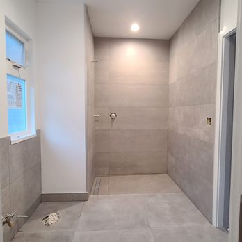 Marblus Granite & Tile - Bathroom oversized tile floor, shower floor to ceiling and wainscot - General Contractors Near Me - San Jose, California Marblus Granite & Tile - Bathroom oversized tile floor, shower floor to ceiling and wainscot - General Contractors Near Me - San Jose, California