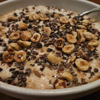 Majordomo - The coconut dessert. 4/5. It tasted like rice pudding with coco nibs, roasted hazelnuts and coconut cream - New American Near Me - Los Angeles, California