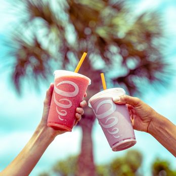 Jamba - two people holding up two cups of smoothie - Juice Bars & Smoothies Near Me - Scottsdale, Arizona
