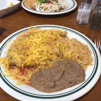 El Taquito - Flautas! Rancho I think. A warm red sauce with lots of cheese. - Mexican Near Me - El Paso, Texas
