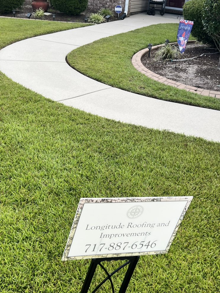 Slide of Longitude Roofing and Improvements