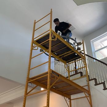 GC Flooring Pros - Electrician hanging light fixtures - Flooring Near Me - Frisco, Texas GC Flooring Pros - Electrician hanging light fixtures - Flooring Near Me - Frisco, Texas