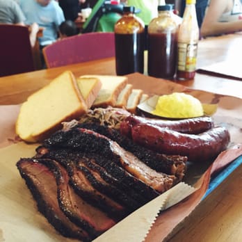 Franklin Barbecue - Look at that beautifully sliced brisket and that smoked sausage... - Barbeque Near Me - Austin, Texas
