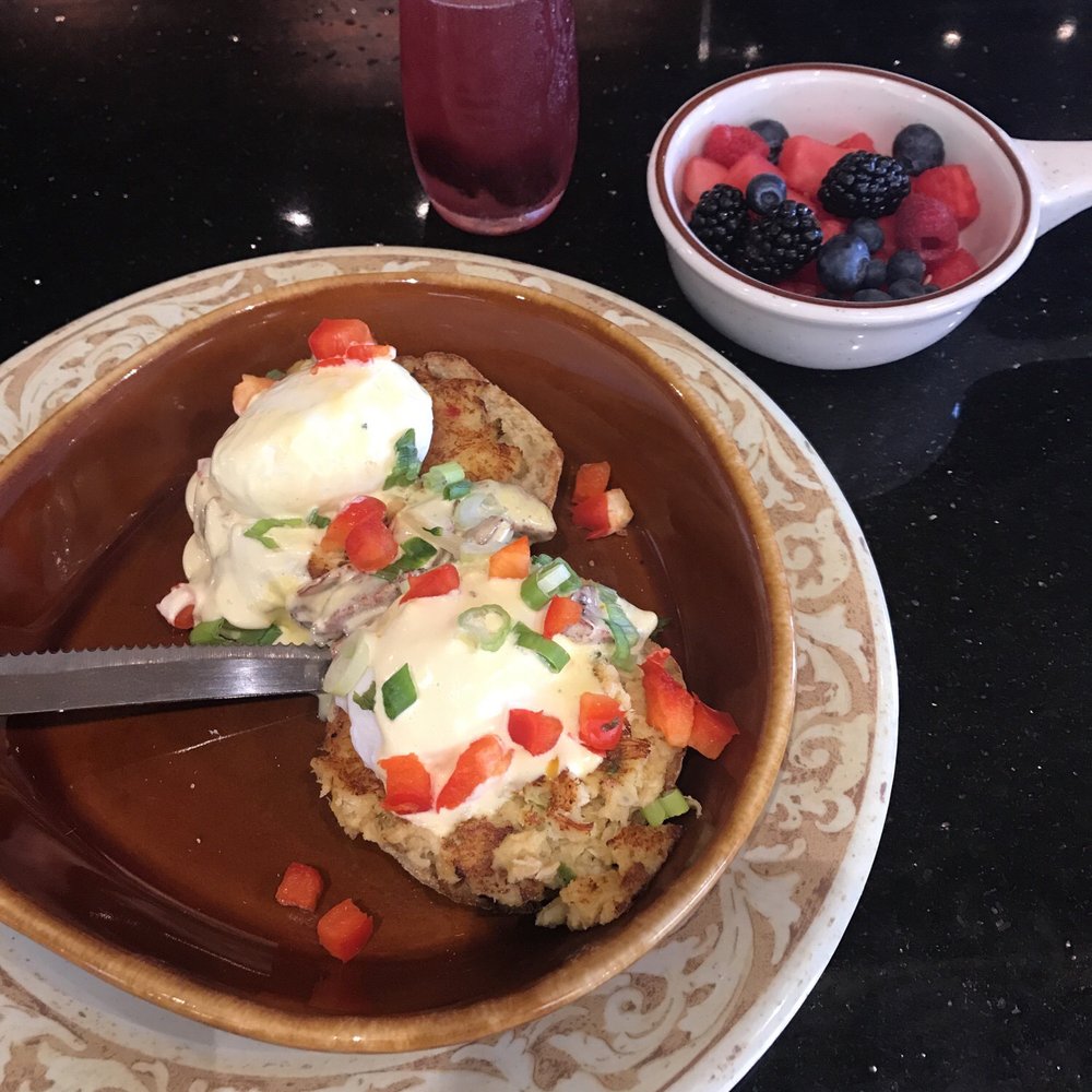 Another Broken Egg Cafe - Crab cake Benedict with fresh fruit and a black cherry mimosa!!! - Breakfast & Brunch Near Me - Shenandoah, Texas Another Broken Egg Cafe - Crab cake Benedict with fresh fruit and a black cherry mimosa!!! - Breakfast & Brunch Near Me - Shenandoah, Texas
