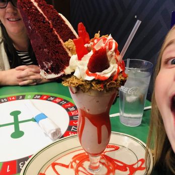 Maxie's - The Elmo shake! Topped with a slice of red velvet cake!!!! - Breakfast & Brunch Near Me - Las Vegas, Nevada