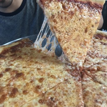 Pizza Johny's - Cheese pull - Pizza Near Me - Miami, Florida Pizza Johny's - Cheese pull - Pizza Near Me - Miami, Florida