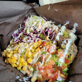 Tucos Taco Lounge - a close up of a taco - Mexican Near Me - Sudbury, Ontario Tucos Taco Lounge - a close up of a taco - Mexican Near Me - Sudbury, Ontario