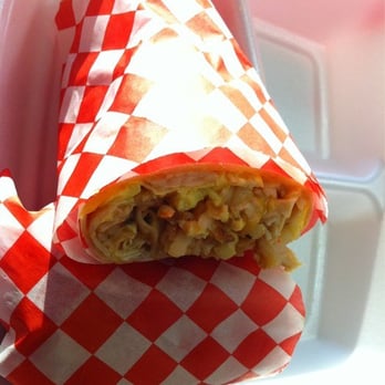 Trimana - a sandwich wrapped in red and white checkered paper - Delis Near Me - Los Angeles, California Trimana - a sandwich wrapped in red and white checkered paper - Delis Near Me - Los Angeles, California