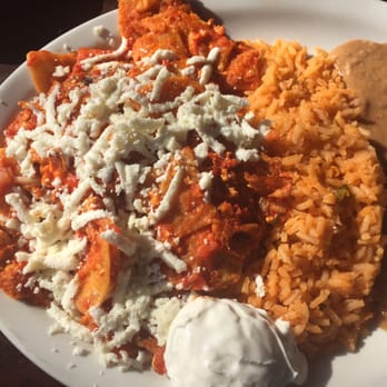 Calaveras - Chilaquiles with salsa roja. - Seafood Near Me - Tulsa, Oklahoma