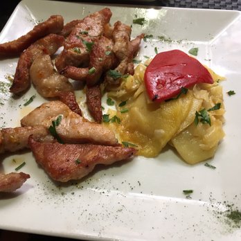 El Sur - Secreto, it was the best tender pork I've had!! - Tapas Bars Near Me - Madrid, M