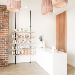 Aura Spa + Beauty Studio - Front View of Checkout Counter & Eminence Shelf.
Our organic skin care line we carry in the studio.