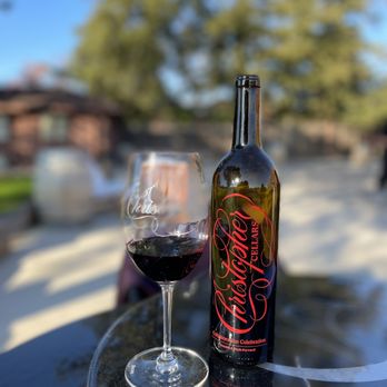 Christopher Cellars - a glass of wine and a bottle of wine - Wine Tasting Room Near Me - Elk Grove, California