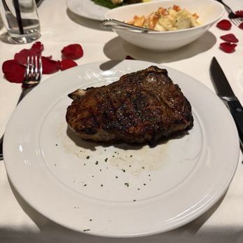 Eddie V's Prime Seafood - 18 oz USDA Prime Bone-In New York Strip - Seafood Near Me - Oak Brook, Illinois