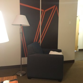 Howard Johnson by Wyndham Quincy - Small sitting chair - Hotels Near Me - Quincy, Massachusetts Howard Johnson by Wyndham Quincy - Small sitting chair - Hotels Near Me - Quincy, Massachusetts