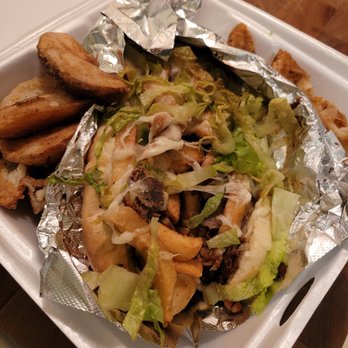 Sabatino's Pizza & Deli - a close up of a salad in a styrofoam container - Pizza Near Me - Syracuse, New York Sabatino's Pizza & Deli - a close up of a salad in a styrofoam container - Pizza Near Me - Syracuse, New York